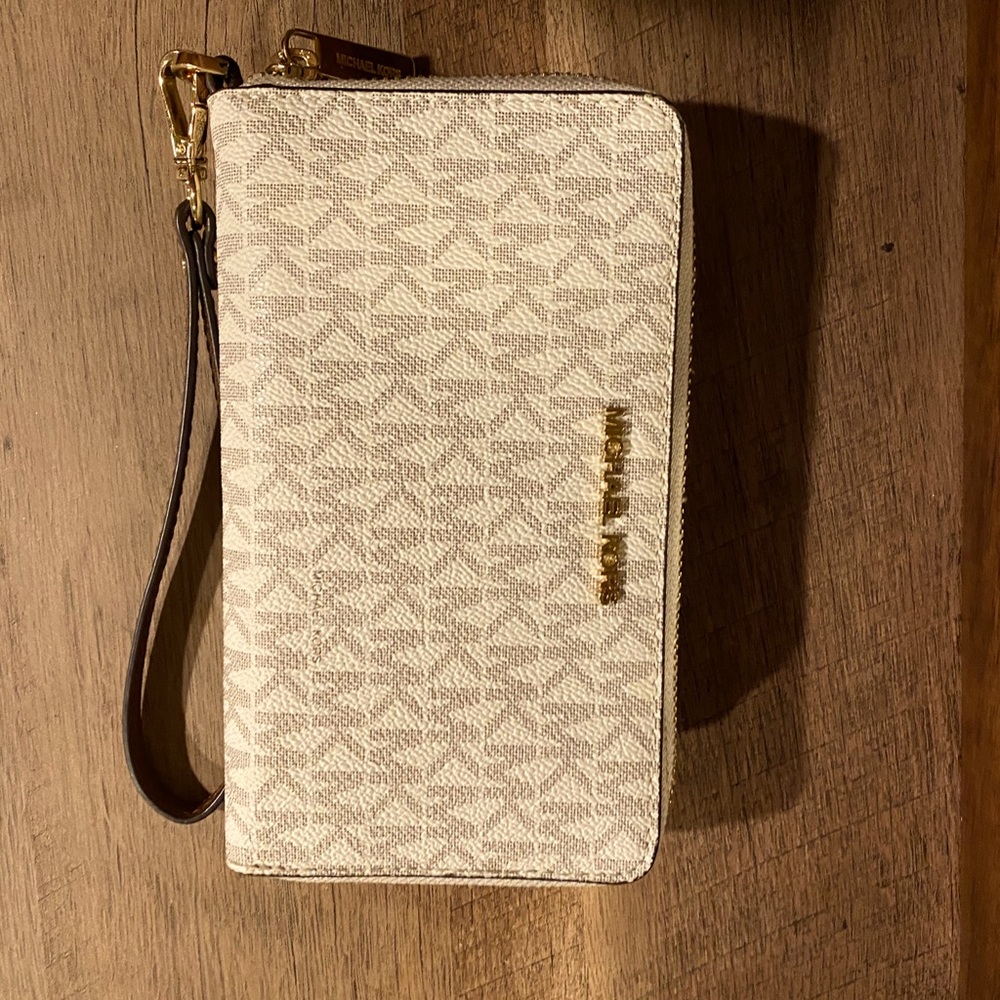Michael kors travel wristlet.